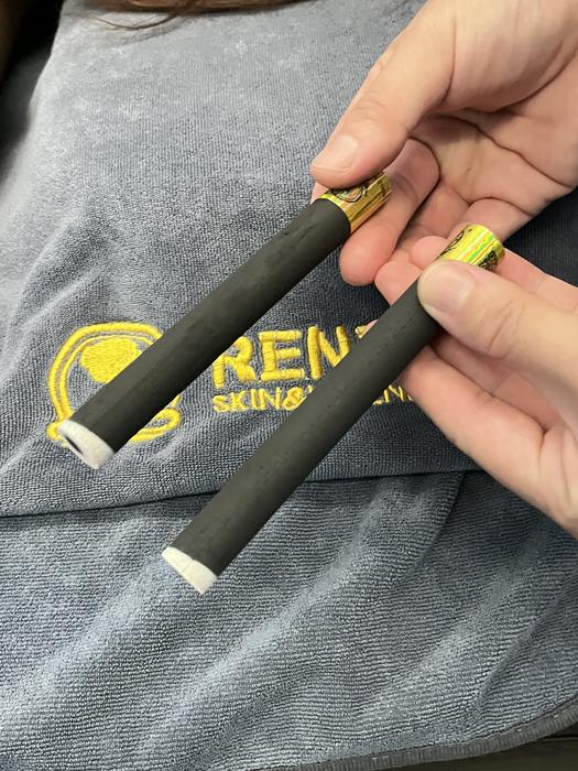 A RENEU moxa stick before a moxibustion session