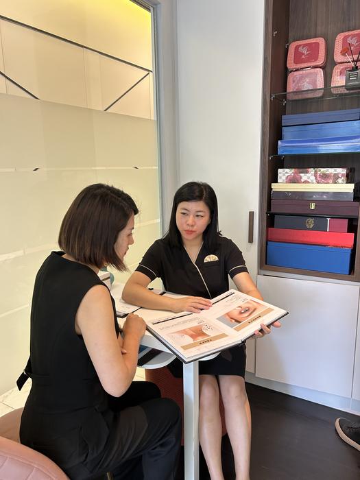 RENEU therapists going through the treatment menu