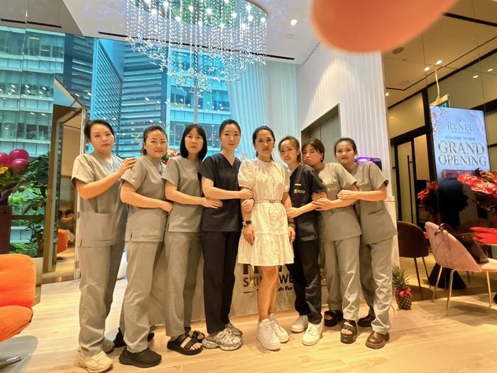 The RENEU Skin & Wellness team at an outlet opening